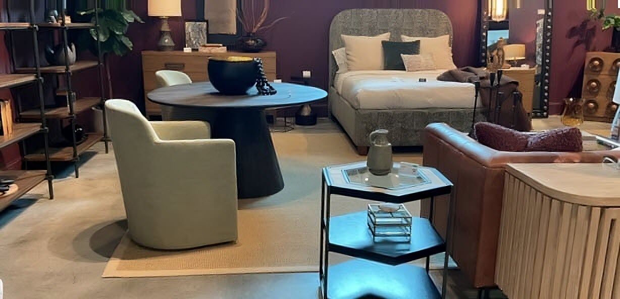 Interior with emerald green, wine red, sapphire blue, and warm brown accents – Spring 2025 color trend